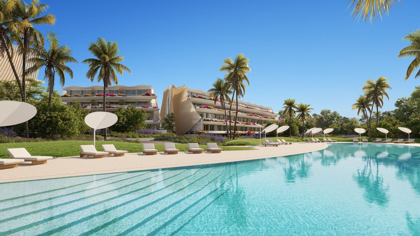 A view of the pool and landscaped gardens of a 3-bedroom apartment in Alfaz del Pi - The Estates