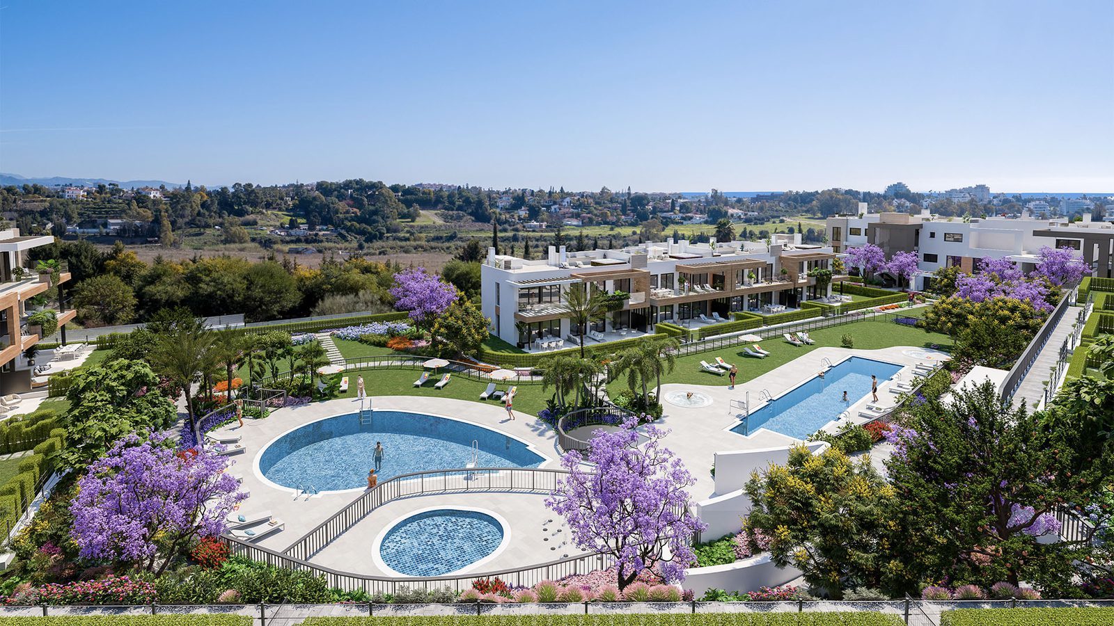 Communal swimming pools and landscaped gardens at a 3-bedroom apartment in Estepona - The Estates