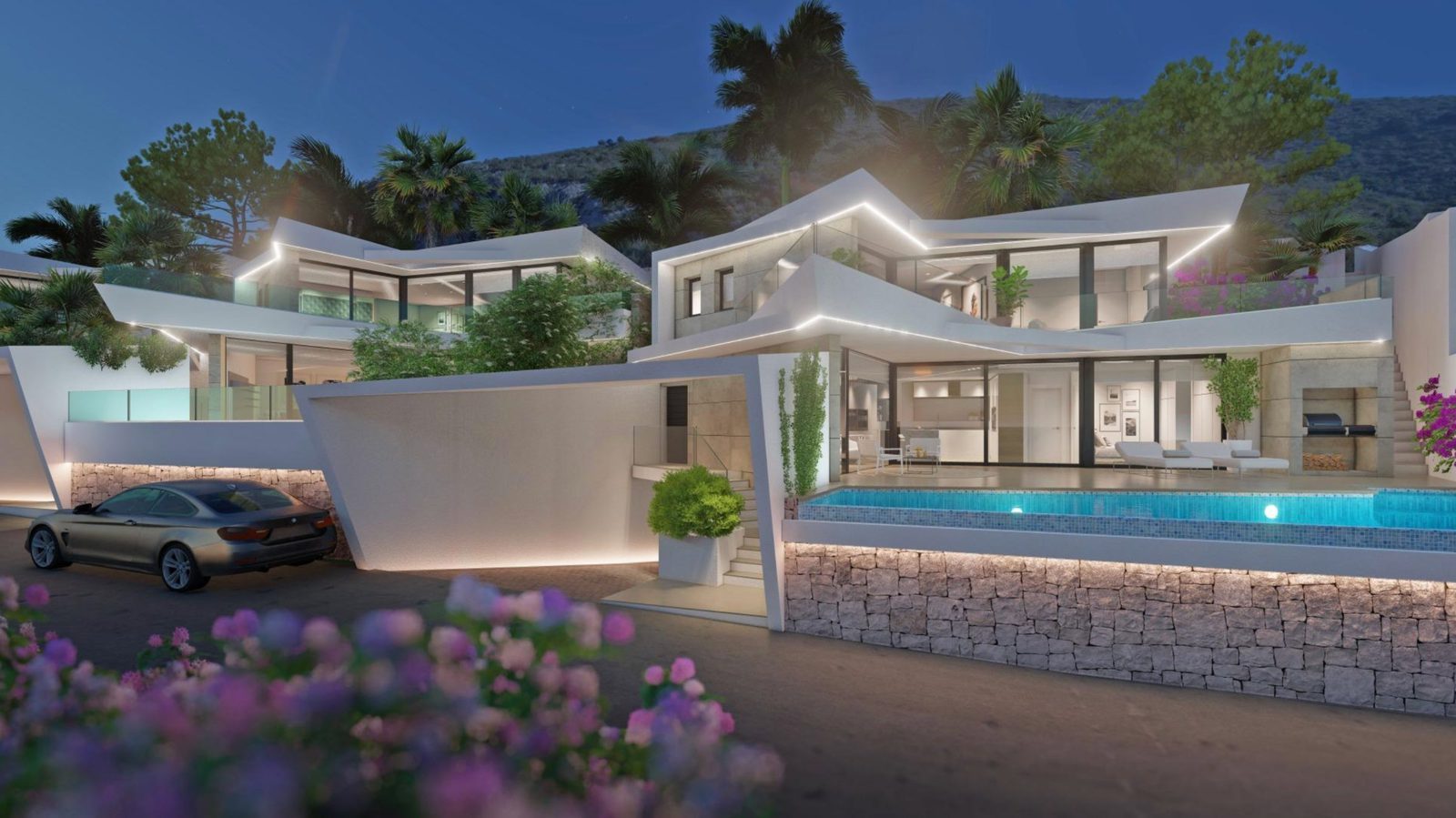 Illuminated modern exterior with pool and terraces of a 3-bedroom villa in Benitachell - The Estates