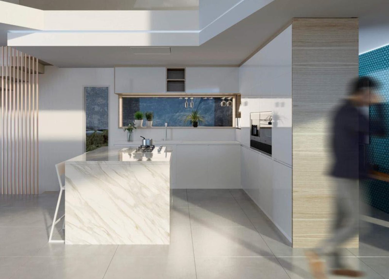 Modern white kitchen with marble island and integrated appliances in a 3-bedroom villa in Benitachell - The Estates