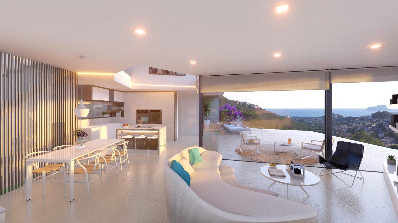 Open-plan kitchen, dining and living area with panoramic sea views of a 3-bedroom villa in Benitachell - The Estates