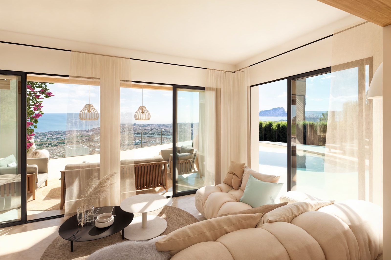 Stylish living room with sea and city views inside a 4-bedroom villa in Moraira - The Estates