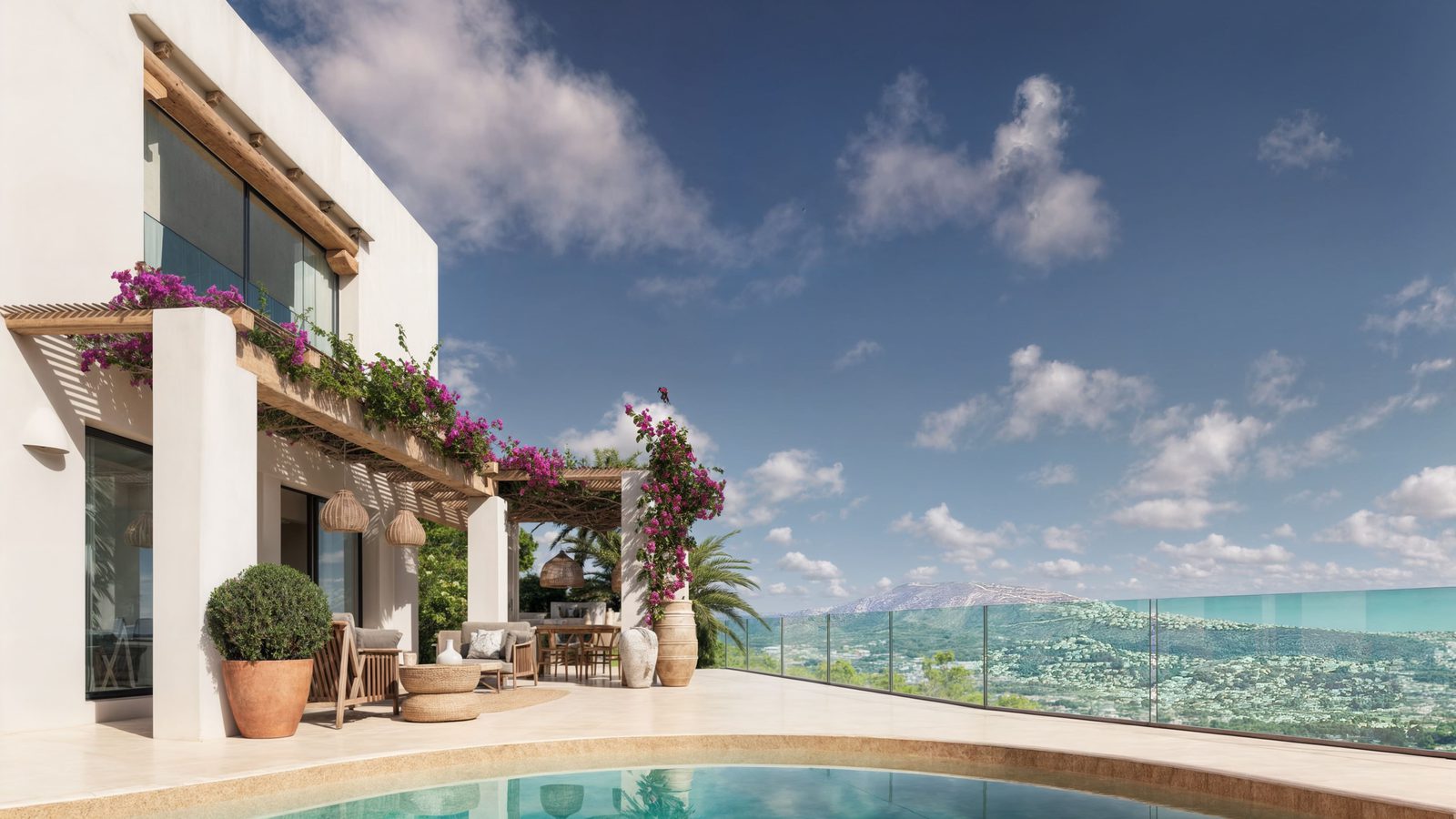 Exterior view of a 4-bedroom villa in Moraira with a pool and sea views - The Estates