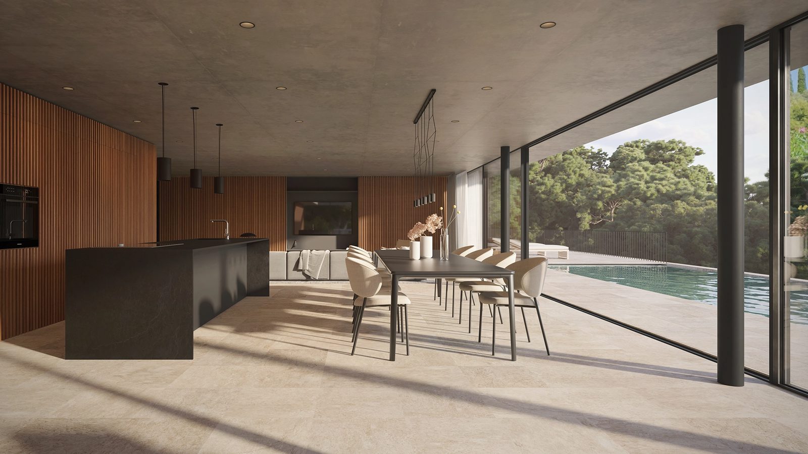 Open-plan kitchen, dining and living area overlooking the pool of a 4-bedroom villa in Ben