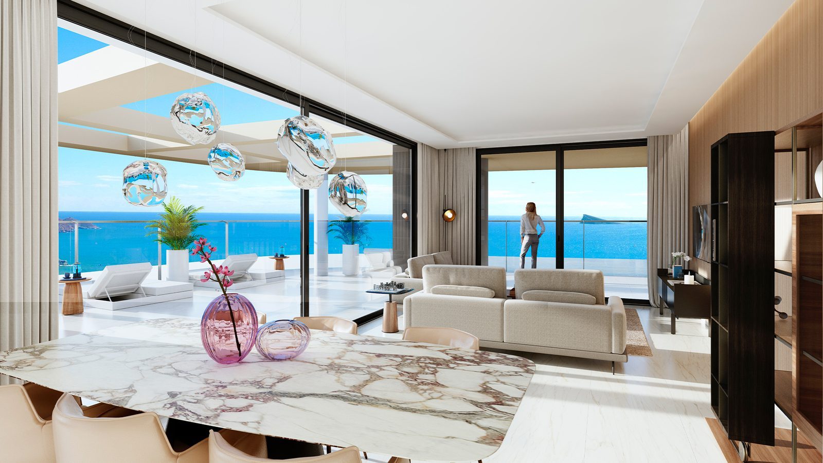 Open-plan living and dining room with panoramic sea views of a 2-bedroom apartment in Benidorm - The Estates