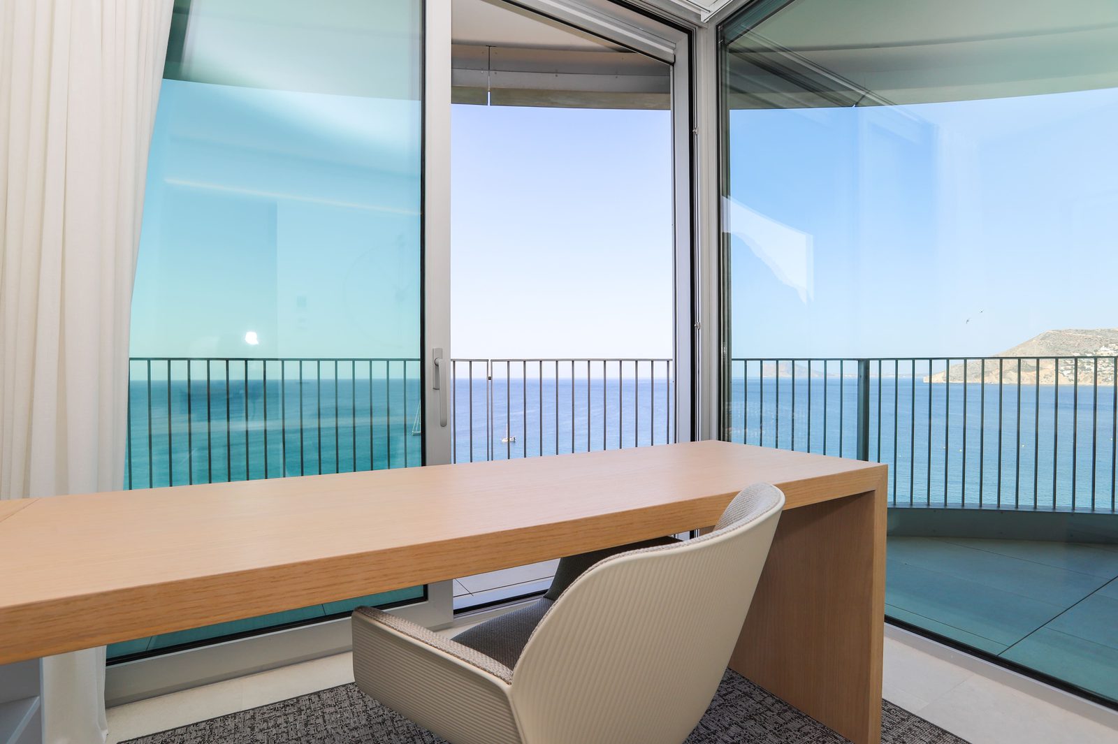 Panoramic sea view from a modern desk in a 4-bedroom apartment in Calpe - The Estates