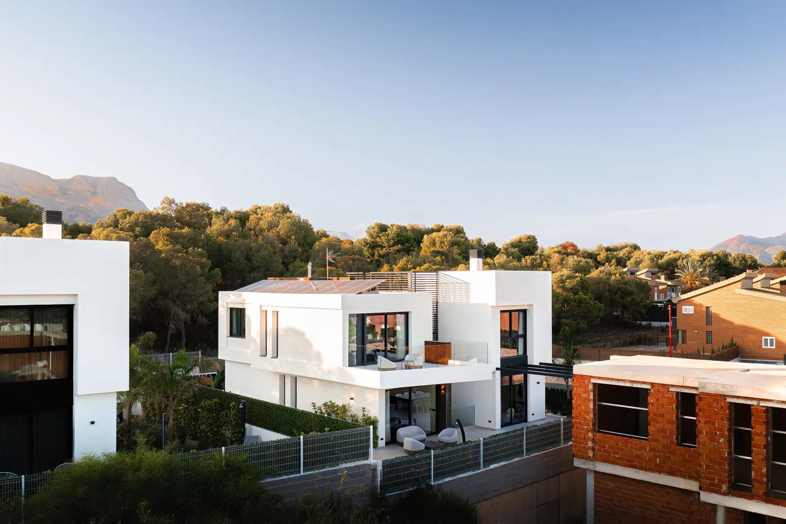 Modern villa exterior with sea and mountain views of a 4-bedroom villa in La Nucia - The Estates