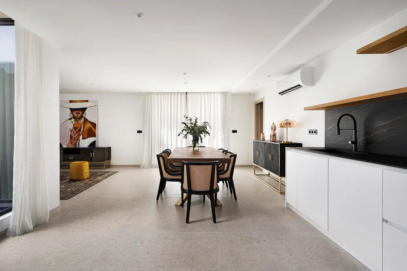Stylish dining area with a modern kitchen in a 4-bedroom villa in La Nucia - The Estates