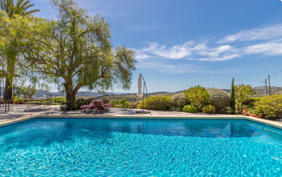 A beautiful pool and garden area of an 8-bedroom finca in Moraira - The Estates
