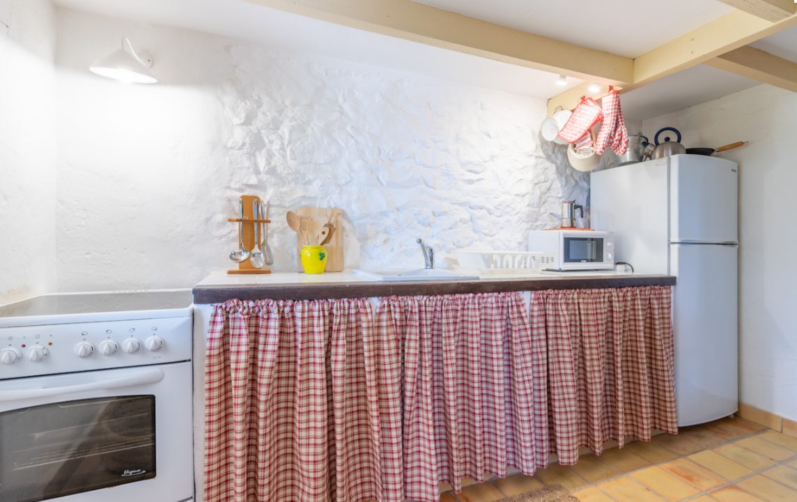 A well-equipped kitchen area in an 8-bedroom finca in Moraira - The Estates