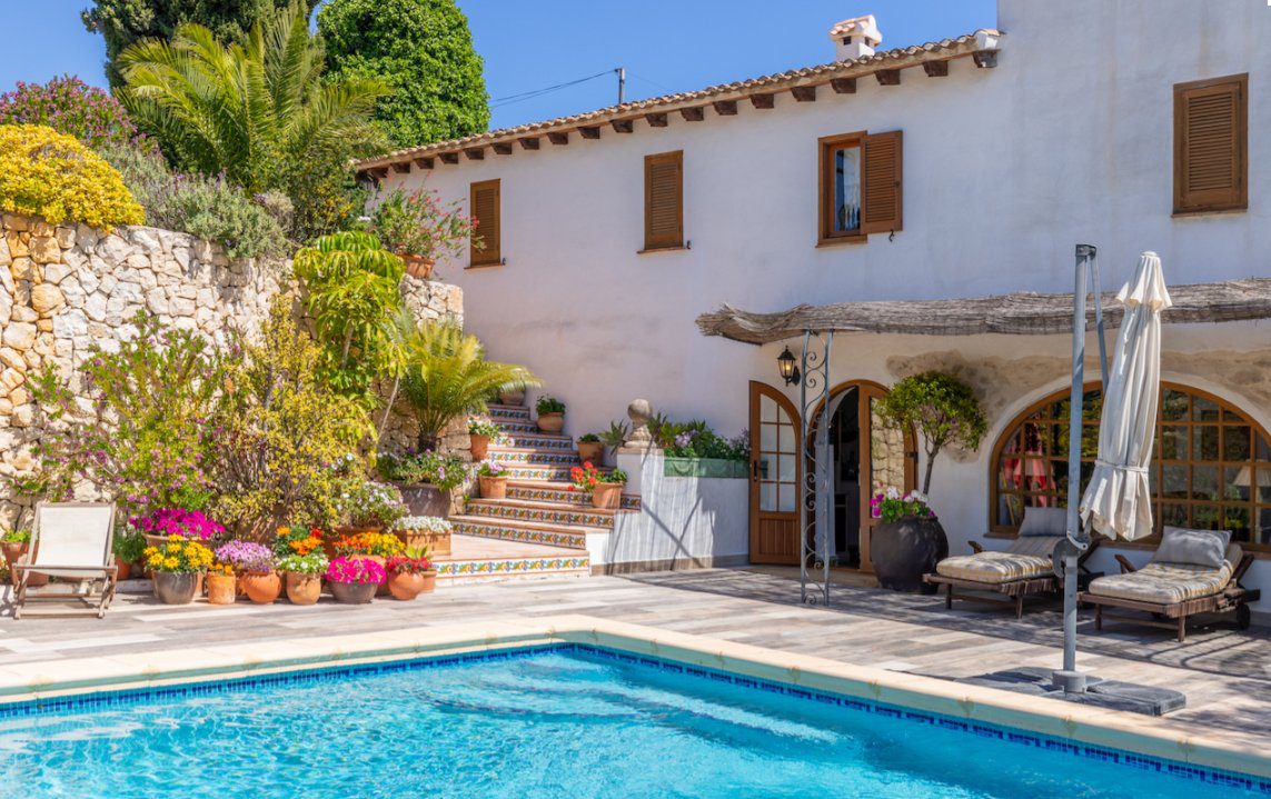 Exterior view of a beautiful 8-bedroom finca with a pool and garden in Moraira - The Estates