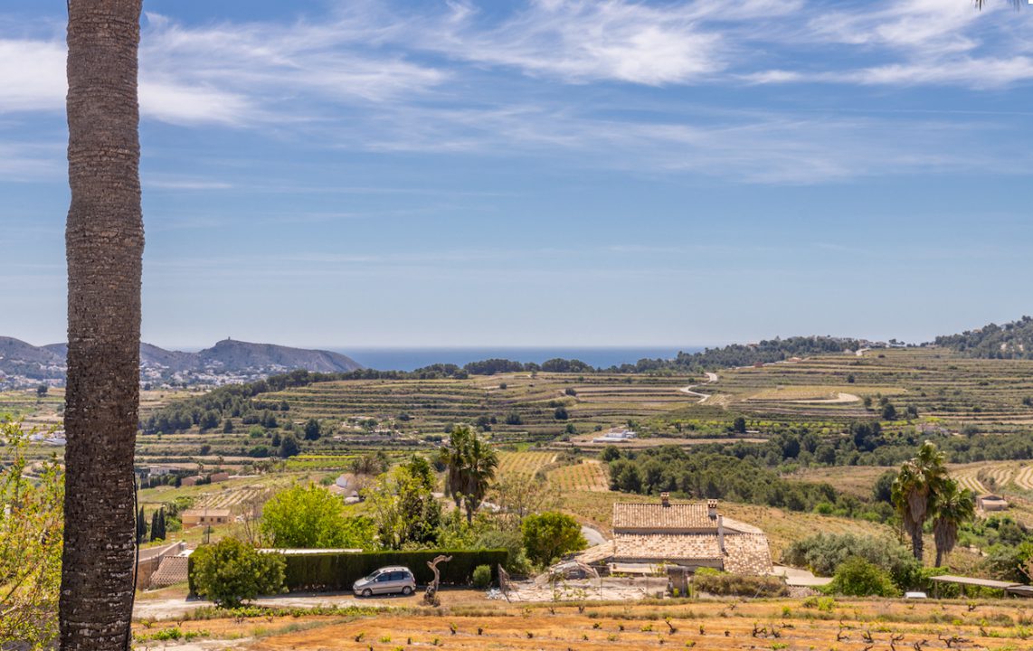Panoramic countryside and sea views from an 8-bedroom finca in Moraira - The Estates