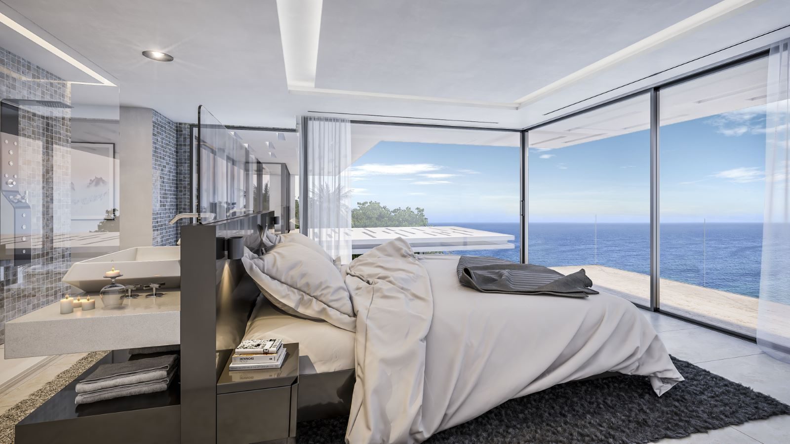 Sea-view bedroom with freestanding bath and floor-to-ceiling windows of a 4-bedroom villa