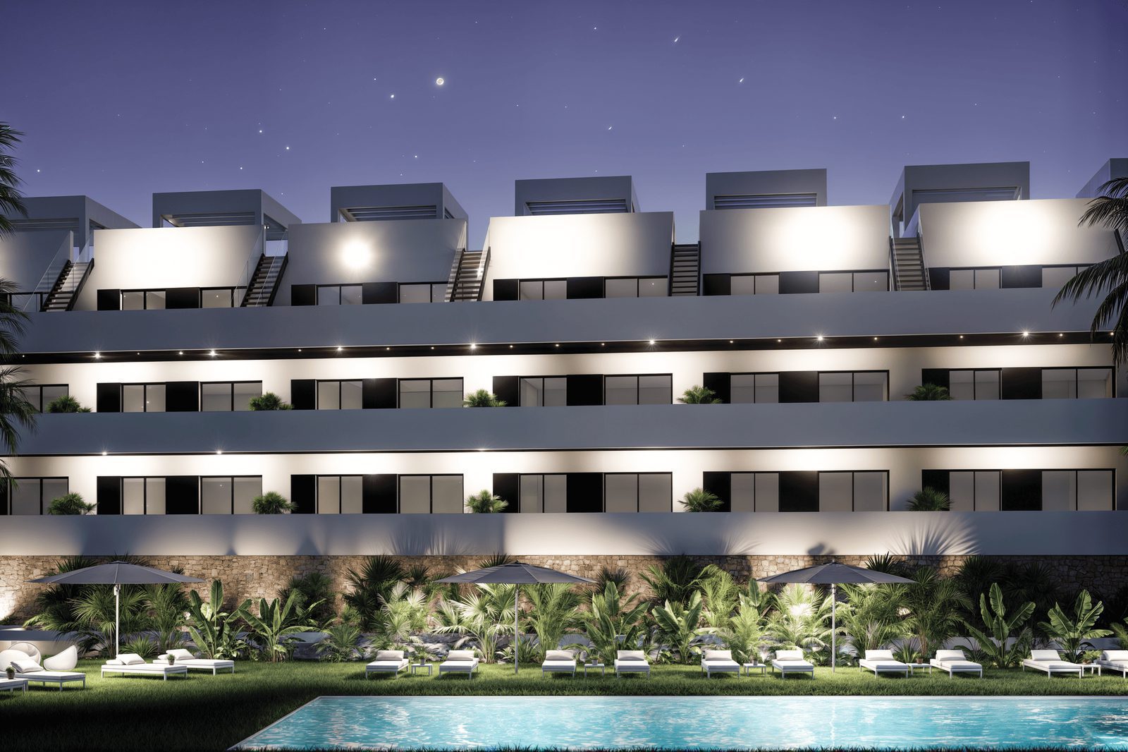 Exterior view of a 2-bedroom penthouse in Finestrat with a pool and landscaped garden - The Estates