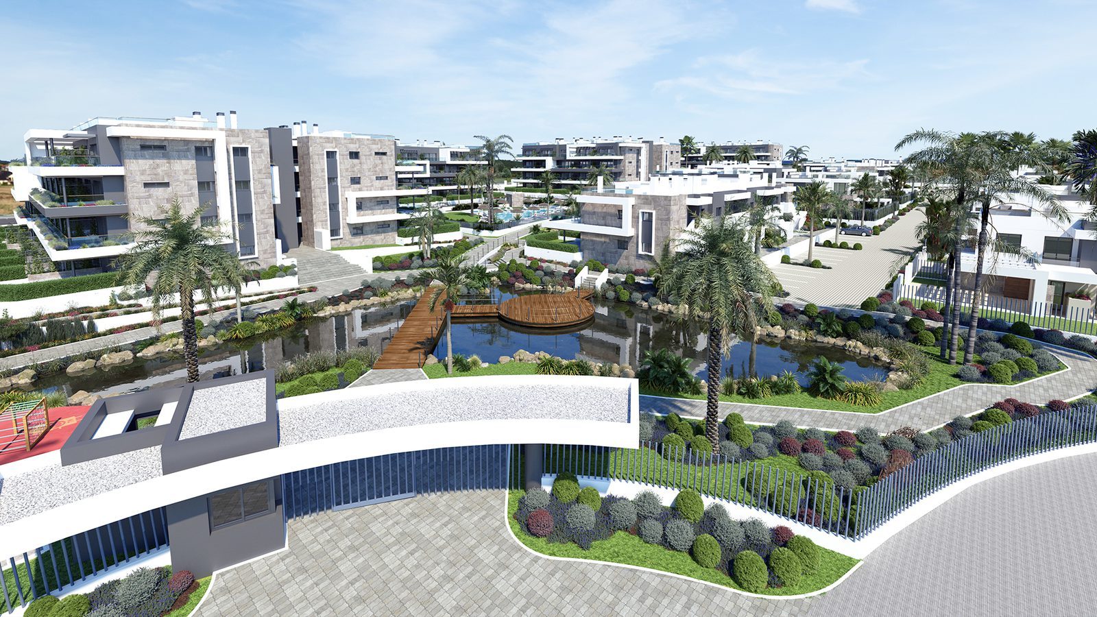 Modern apartment complex with landscaped gardens, palm trees, pond and footbridge in Torrevieja - The Estates