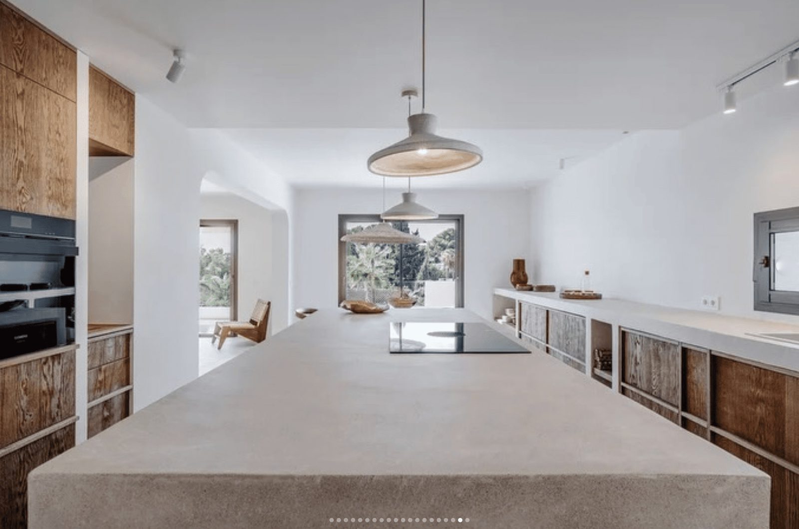 Modern kitchen with island in a 5-bedroom villa in Benissa - The Estates