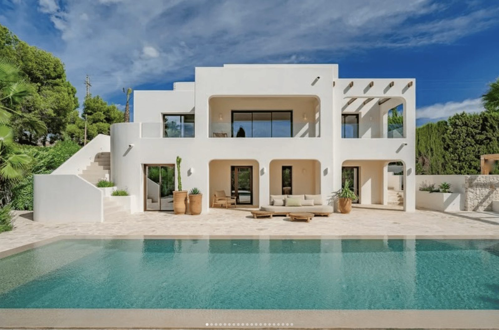 A modern villa with a pool and lush greenery in San Jaime, Benissa - The Estates