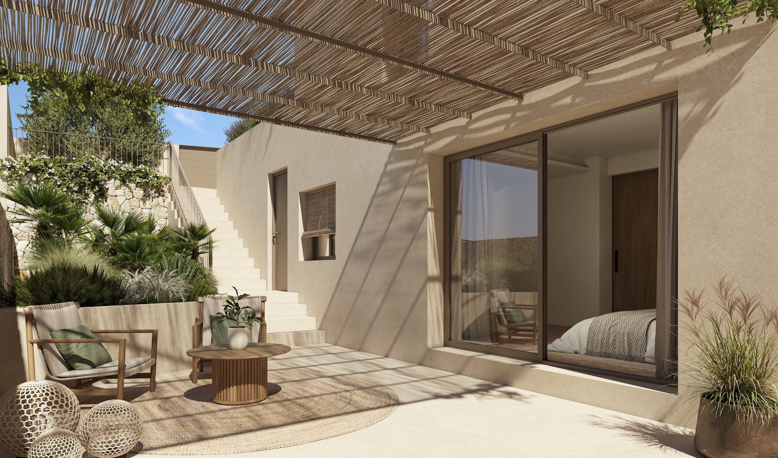 Covered terrace with pergola, seating and garden of a 4-bedroom villa