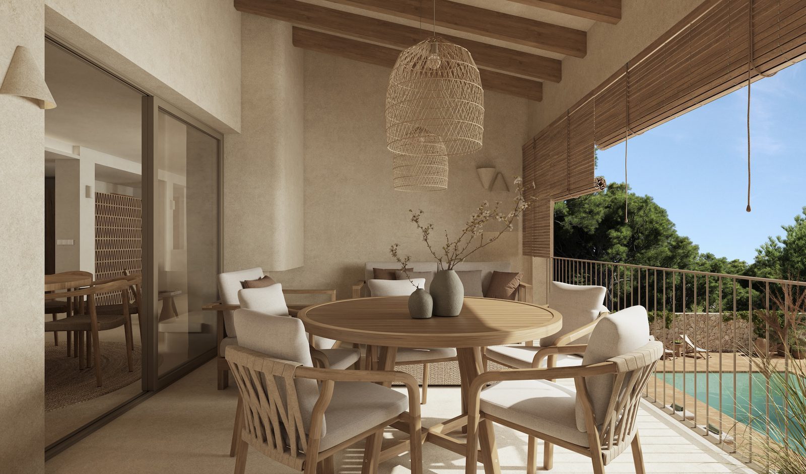 Covered terrace with outdoor dining area overlooking the pool at a 4-bedroom villa in Benissa