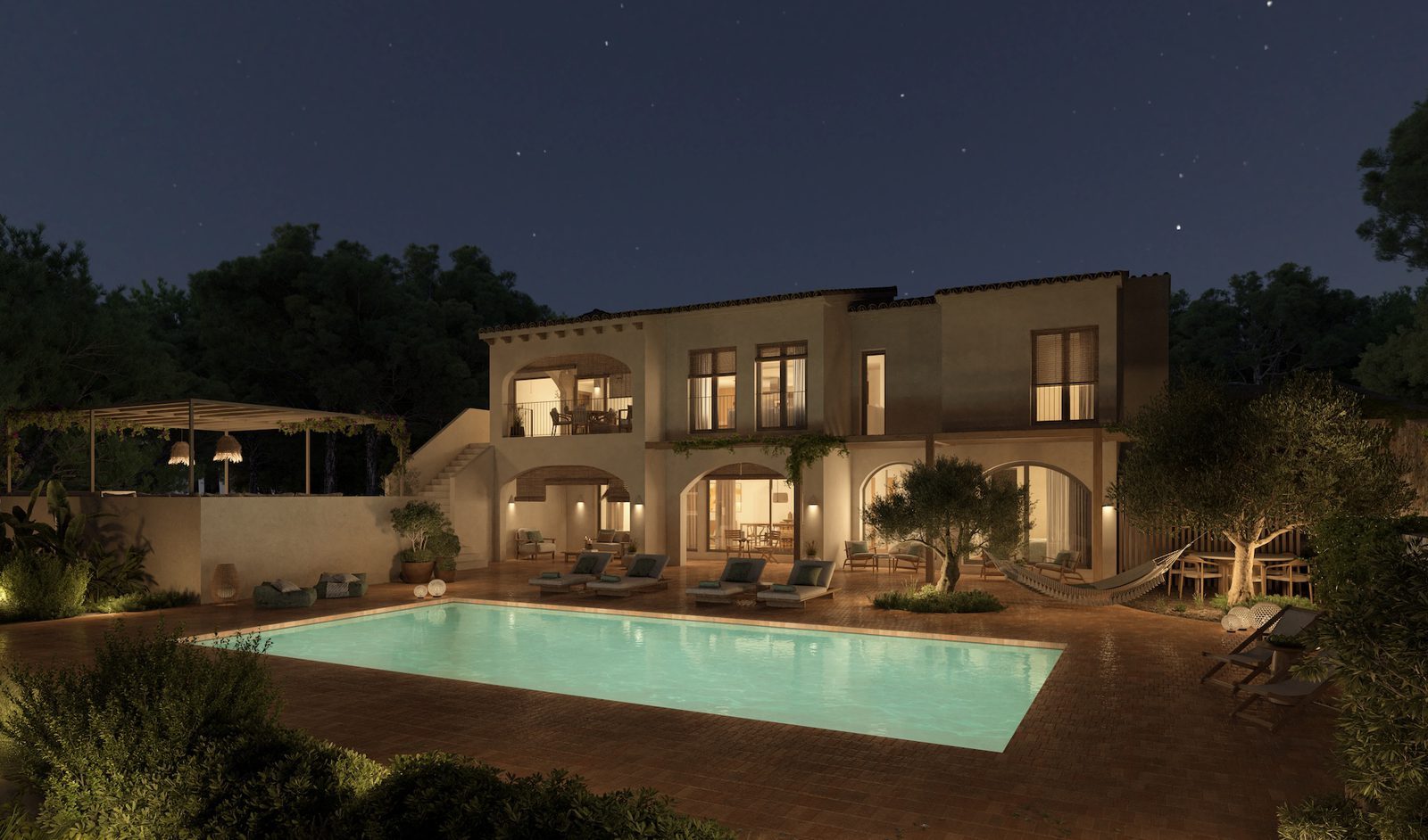 Night view of an illuminated pool, terraces and garden at a 4-bedroom villa in Benissa - The Estates