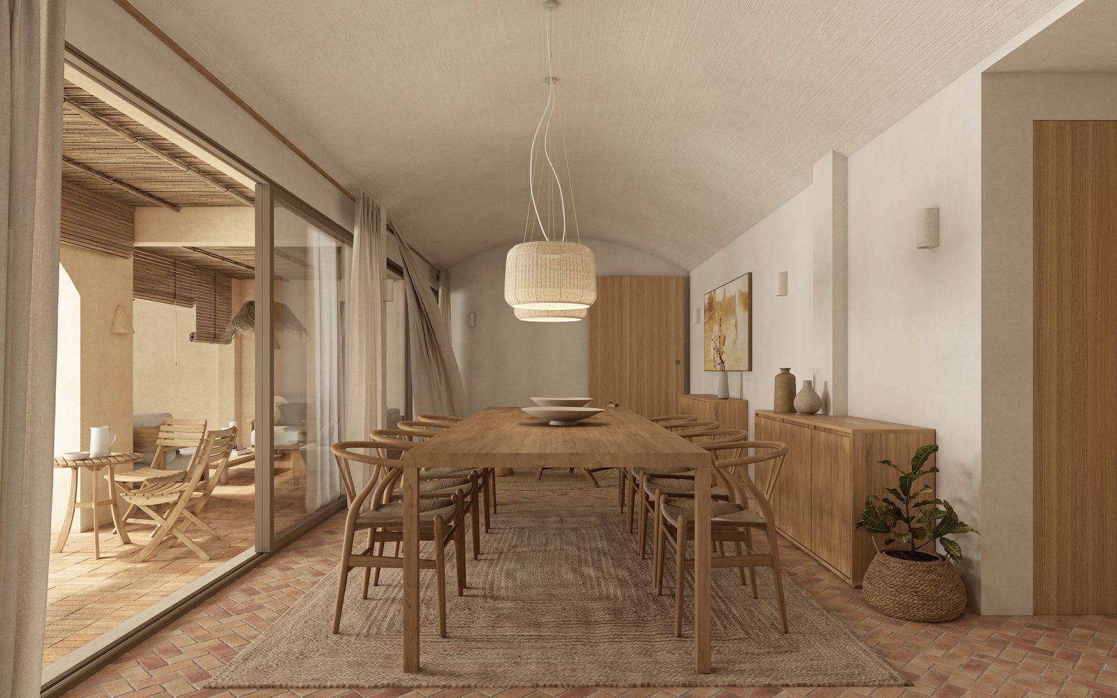 Dining room with wooden table, pendant lights and glazed terrace doors in a 4-bedroom villa in Benissa - The Estates