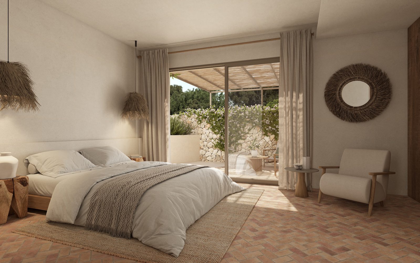 Bright villa bedroom with double bed, armchair and terrace access overlooking a landscaped garden in Benissa - The Estates
