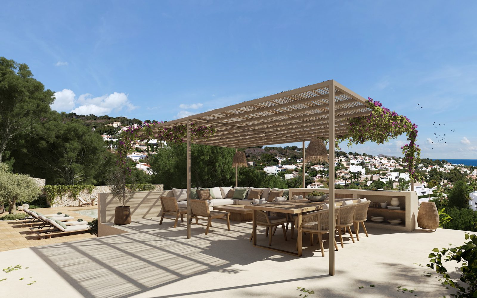 Pergola-shaded terrace with outdoor dining and sea views of a 4-bedroom villa in Benissa - The Estates