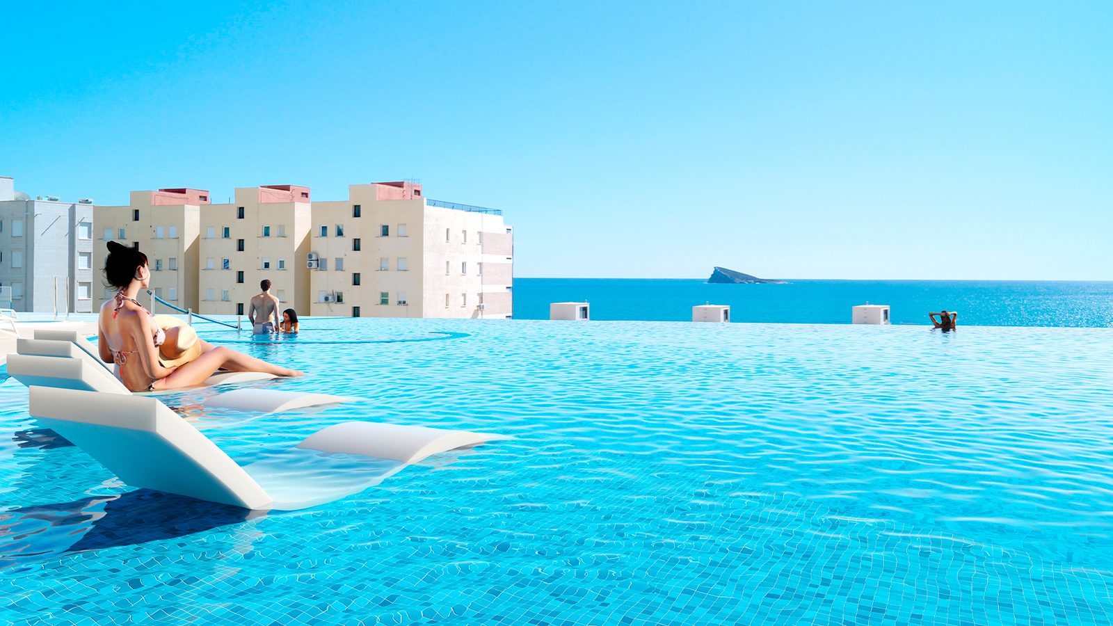Rooftop infinity pool with sea and island views at a 2-bedroom apartment in Benidorm - The Estates