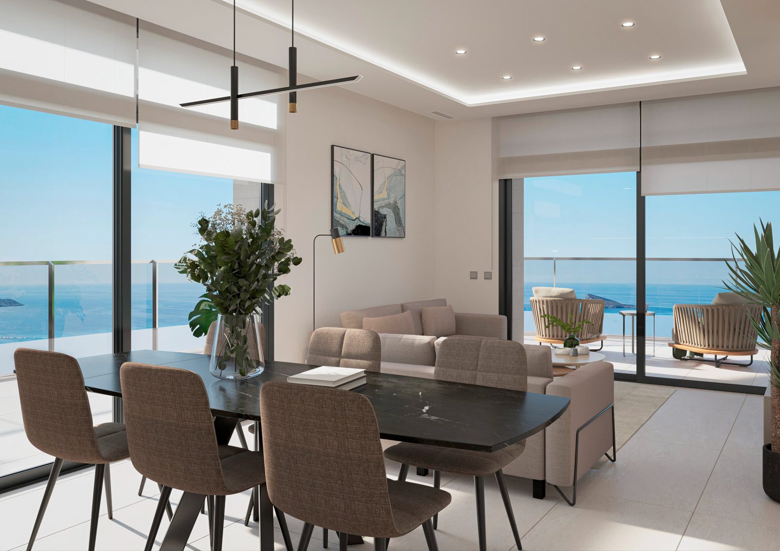 Stylish living and dining area with panoramic sea views in a 4-bedroom apartment in Benidorm - The Estates