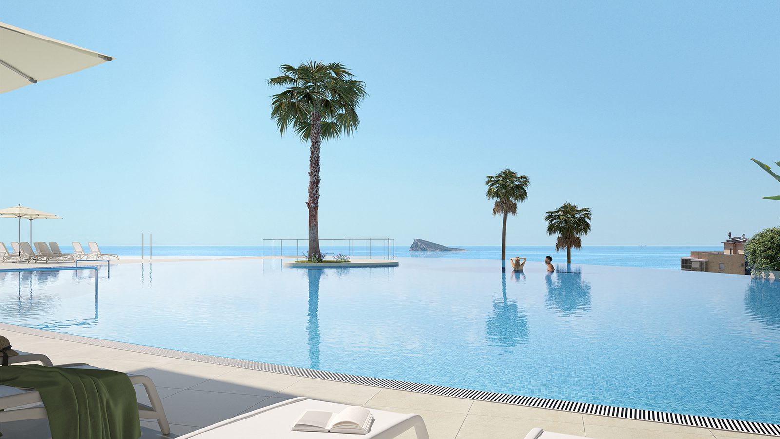 A pool and sea view from a 4-bedroom apartment in Benidorm - The Estates