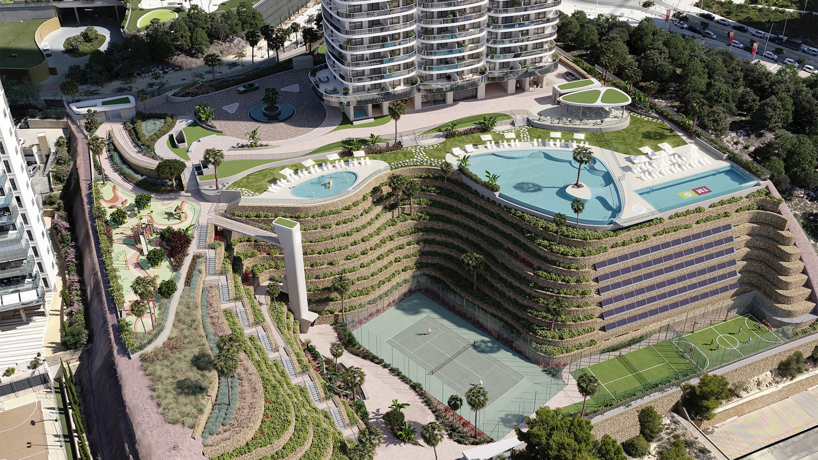 Aerial view of the communal pool and gardens of a 4-bedroom apartment in Benidorm - The Estates
