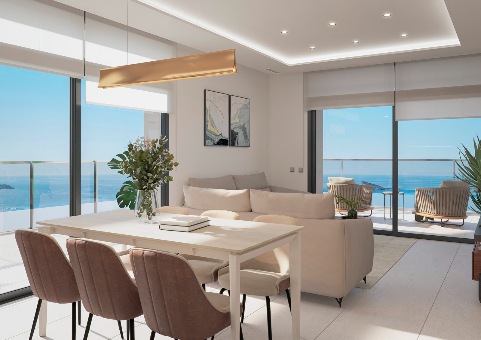 Stylish living and dining area with sea views in a 4-bedroom apartment in Benidorm - The Estates