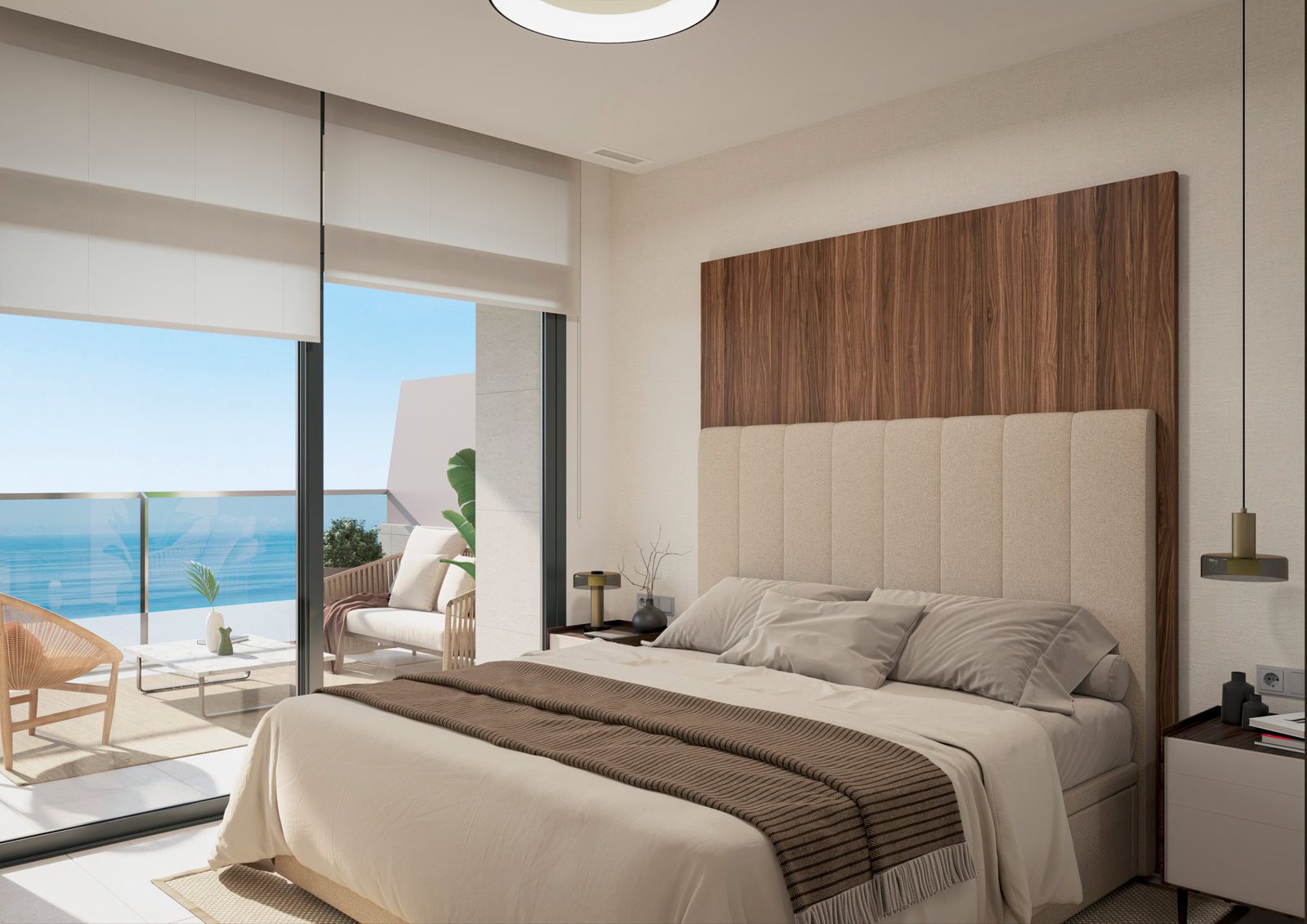 A bright bedroom with sea views from a 4-bedroom apartment in Benidorm - The Estates