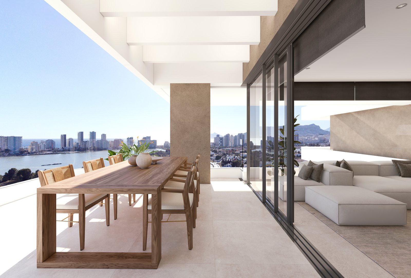 A bright dining area with sea views on a 2-bedroom apartment in Calpe - The Estates