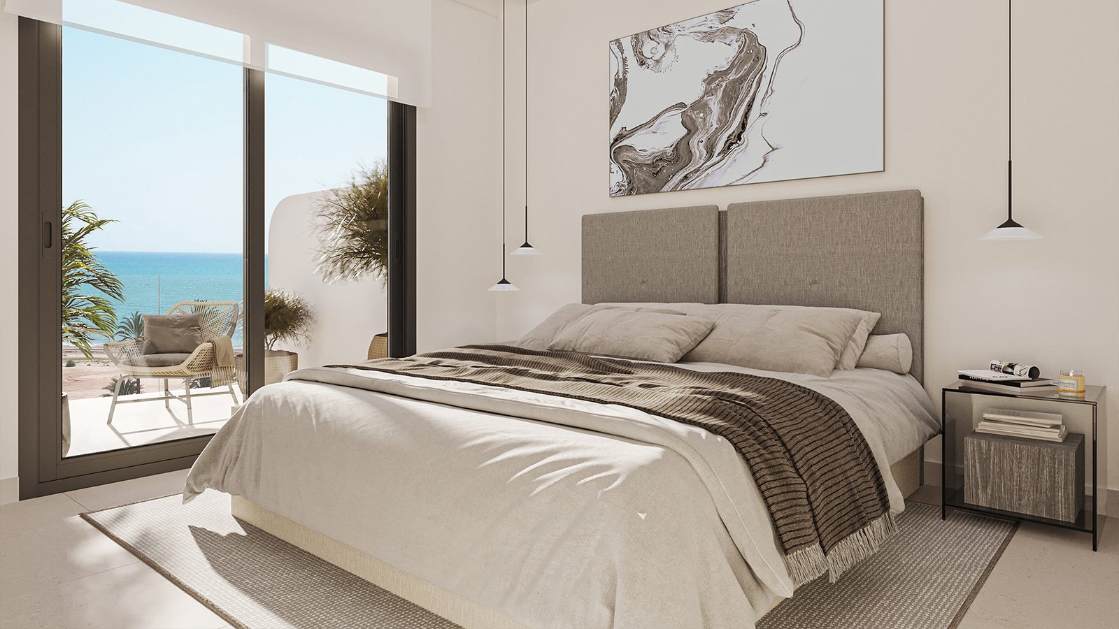 A bright bedroom with a balcony overlooking the sea in a 3-bedroom apartment in El Puig - The Estates
