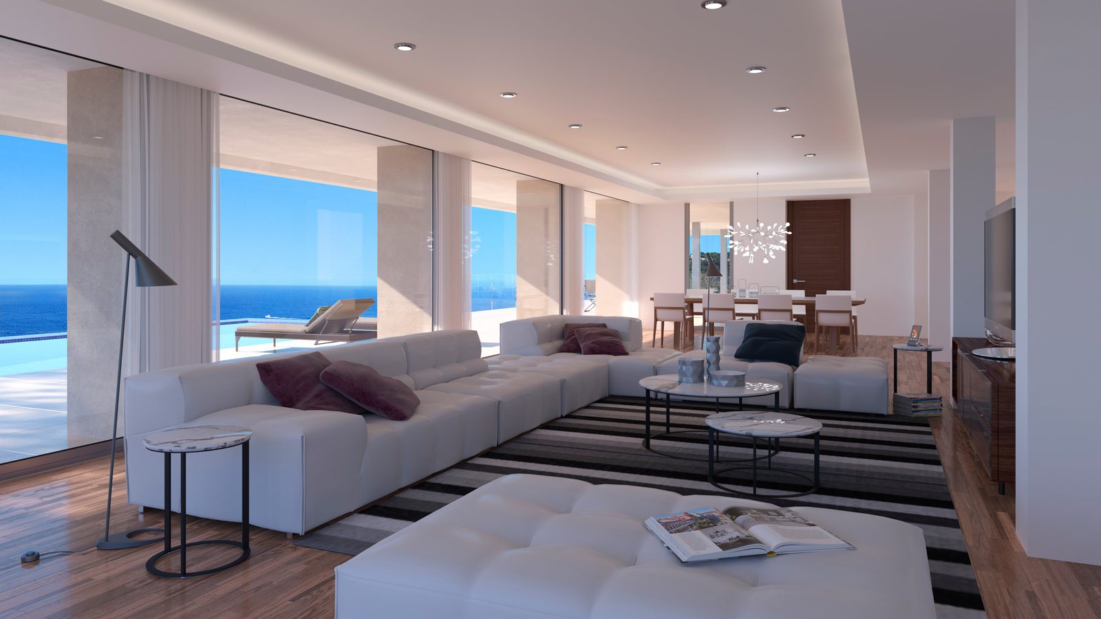 Stylish living room with panoramic sea views inside a 6-bedroom villa in Benitachell - The Estates
