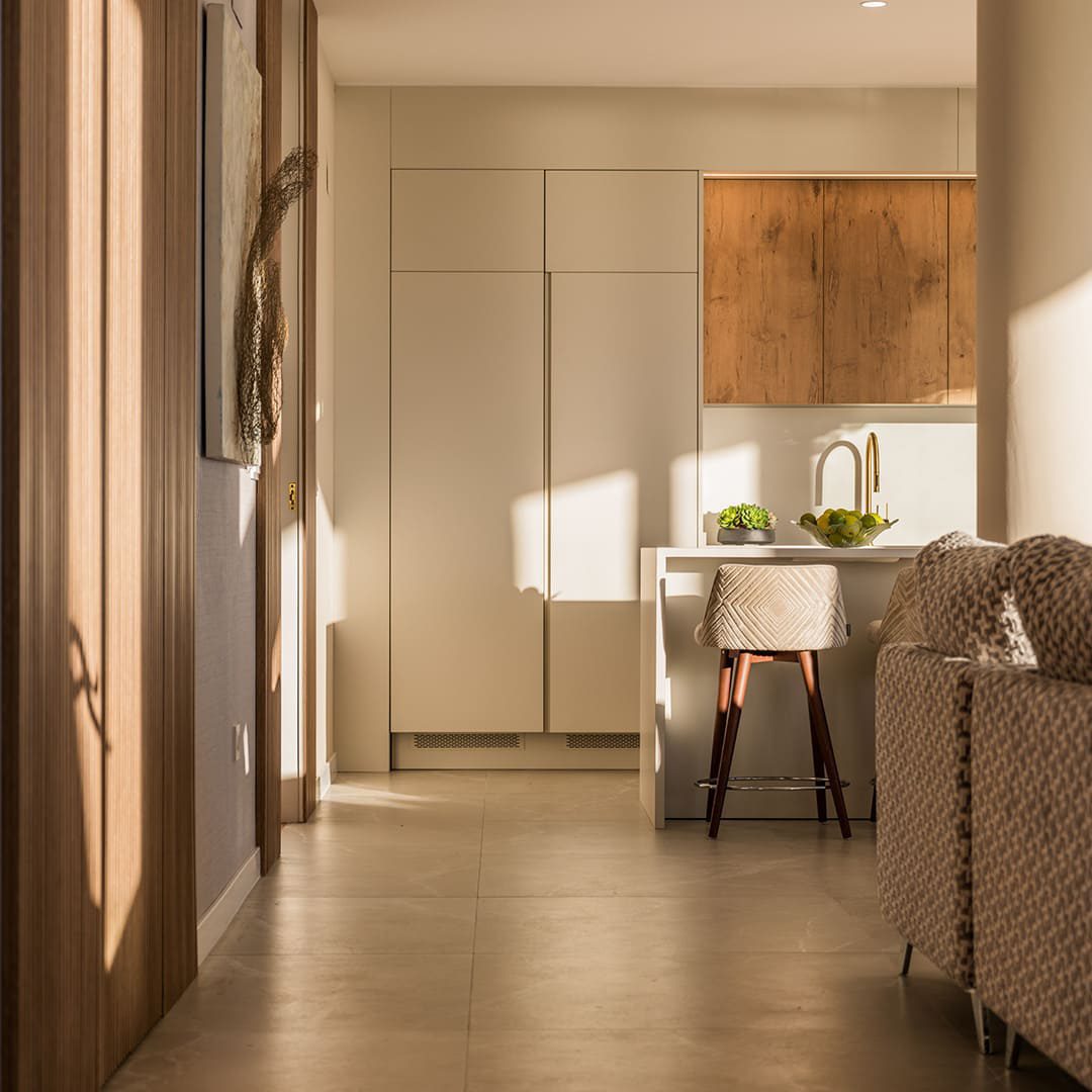 Modern kitchen and living area of a 3-bedroom apartment in Benidorm - The Estates