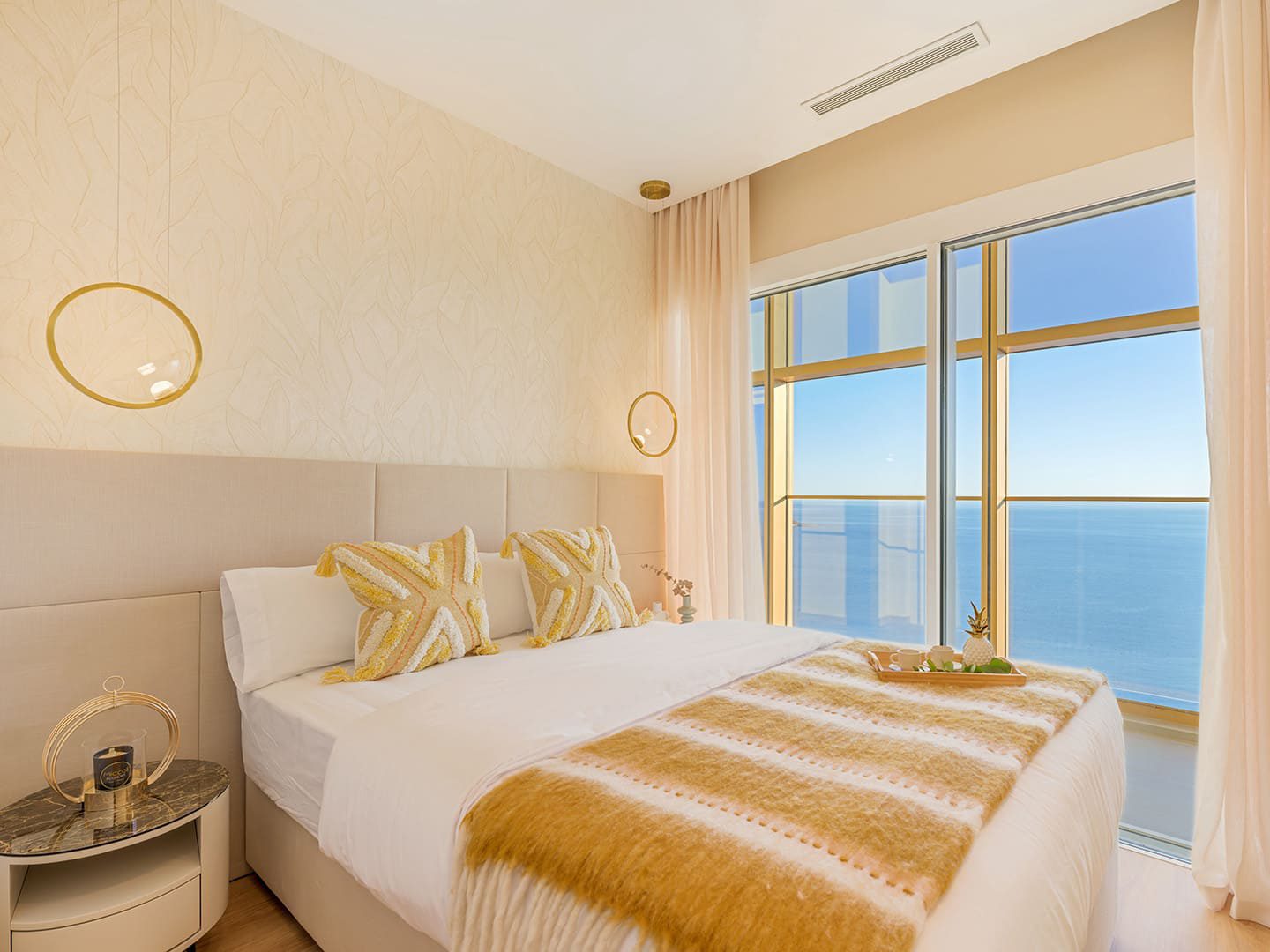 Stylish bedroom with sea views in a 3-bedroom apartment in Benidorm - The Estates