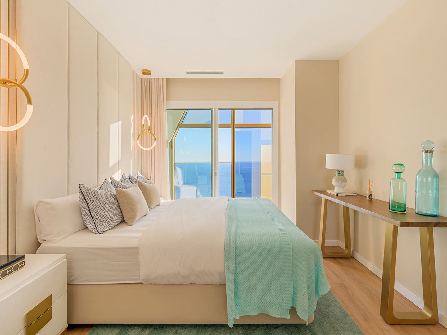 A bright bedroom with sea views in a 3-bedroom apartment in Benidorm - The Estates