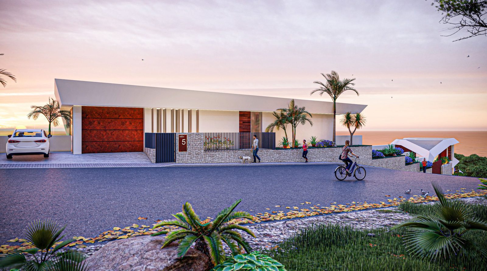 A modern villa exterior with sea views and lush landscaping in Calpe - The Estates