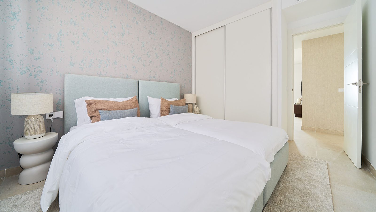 A stylish bedroom in a 3-bedroom apartment in Fuengirola - The Estates