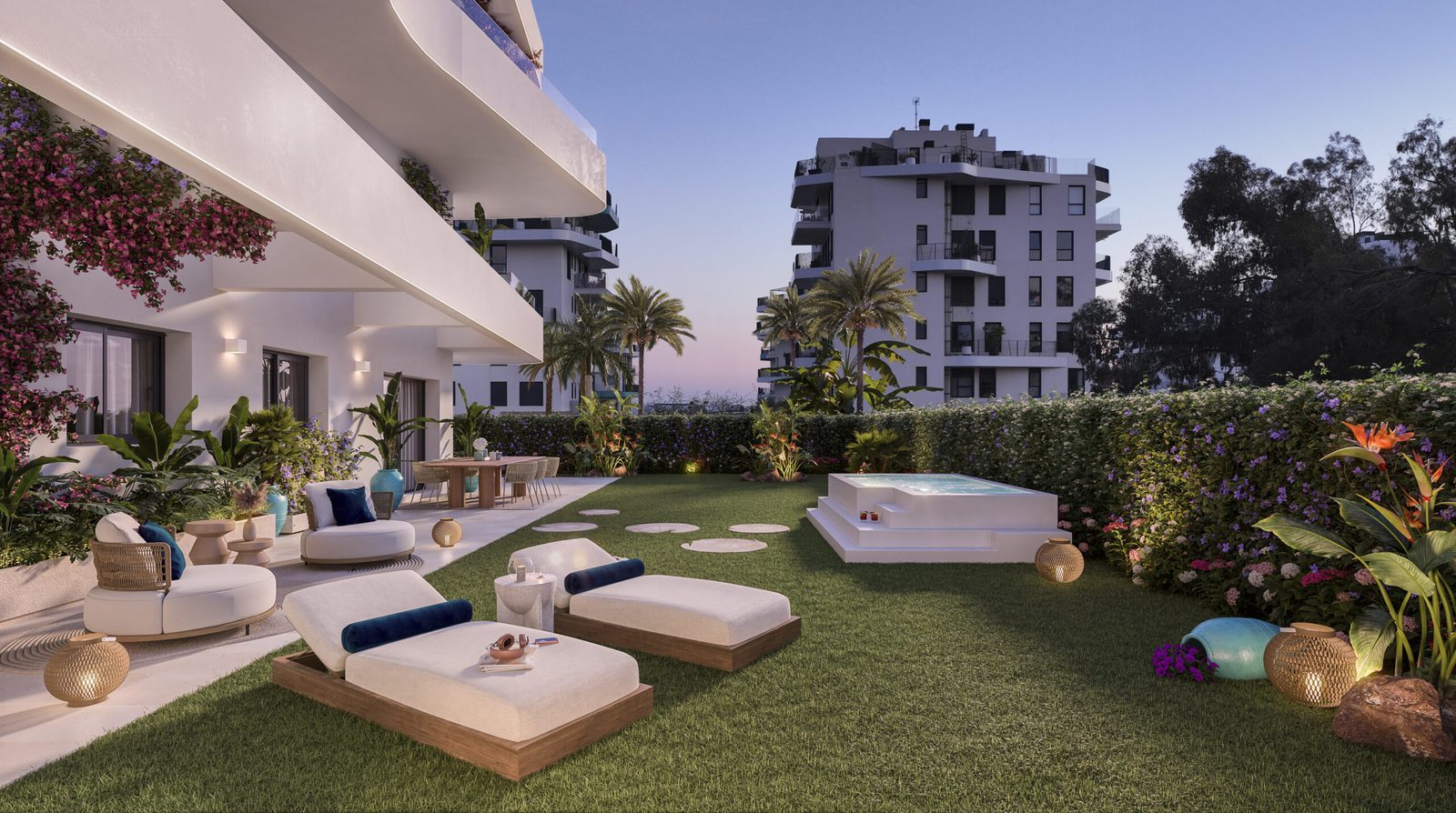 Landscaped private garden with outdoor seating and a raised hot tub of a 2-bedroom apartment in Villajoyosa - The Estates
