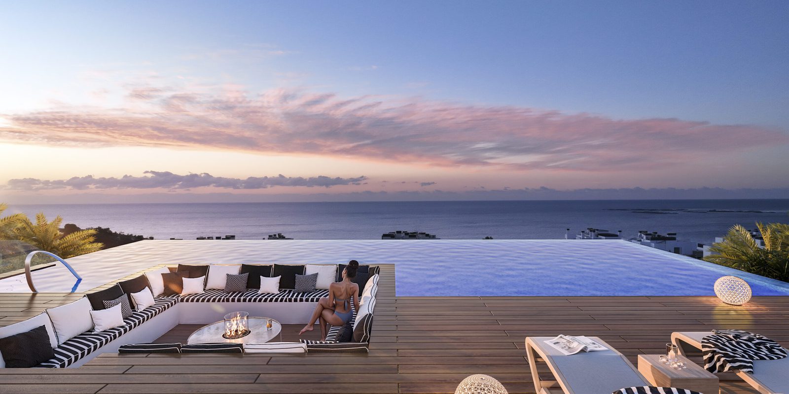 Rooftop terrace with infinity pool, sunken seating and sea views at a 2-bedroom apartment in Villajoyosa - The Estates