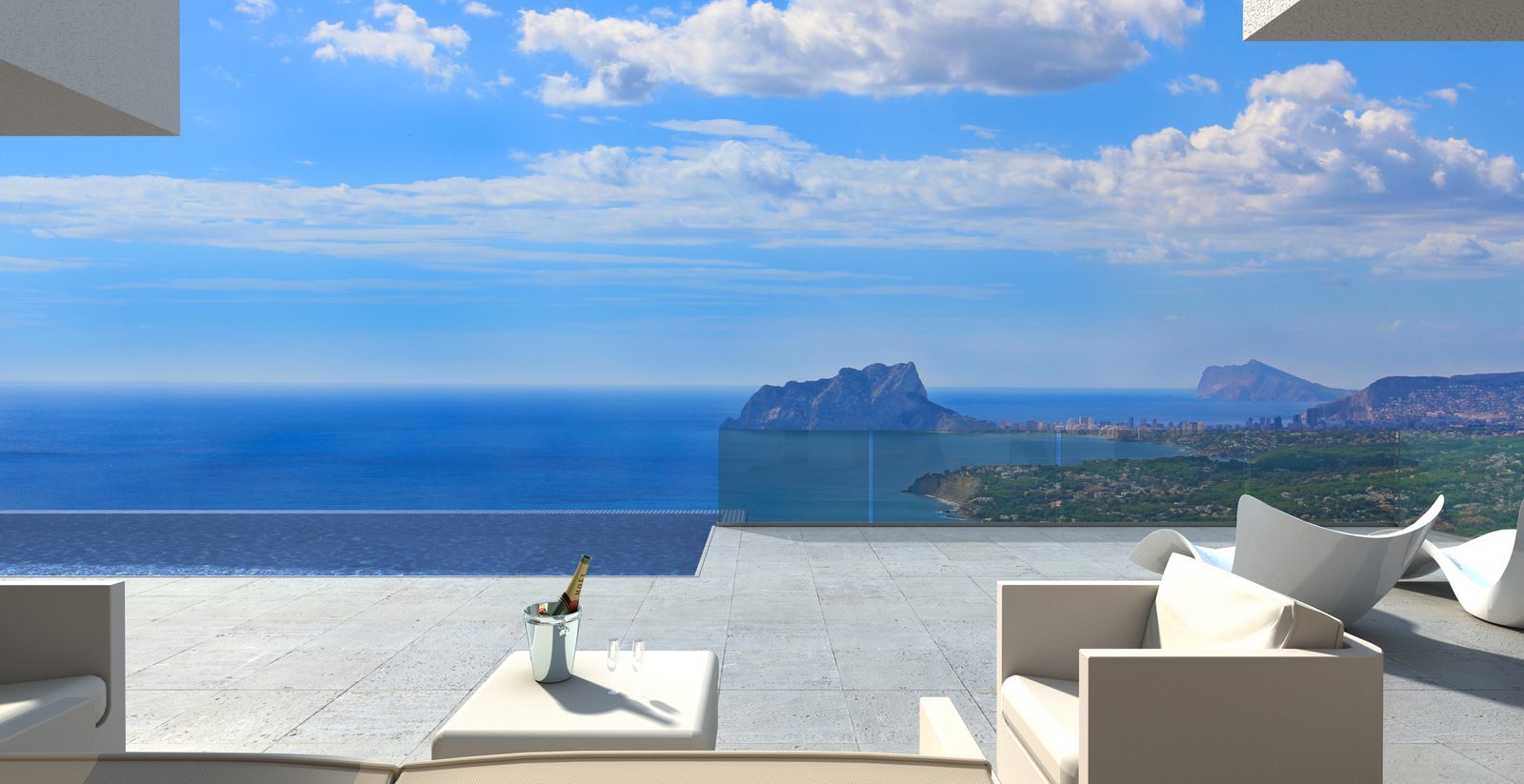 Infinity pool terrace with outdoor seating and panoramic sea views of a 3-bedroom villa in Benitachell - The Estates