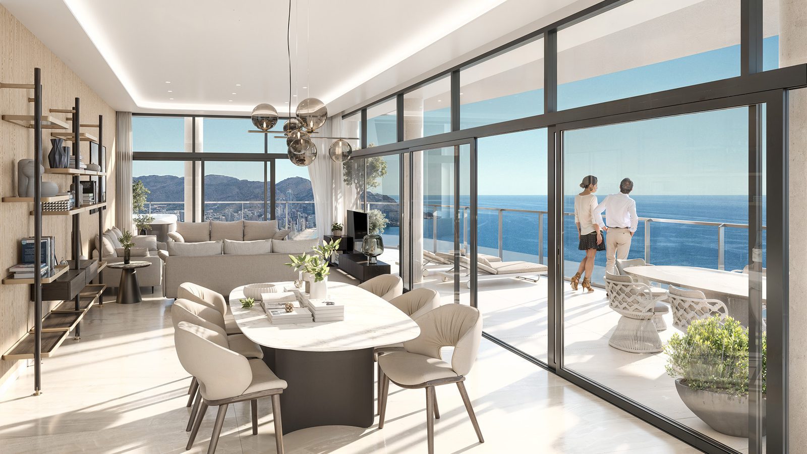 Bright open-plan living and dining room with sea views and terrace of a 2-bedroom apartment in Benidorm - The Estates