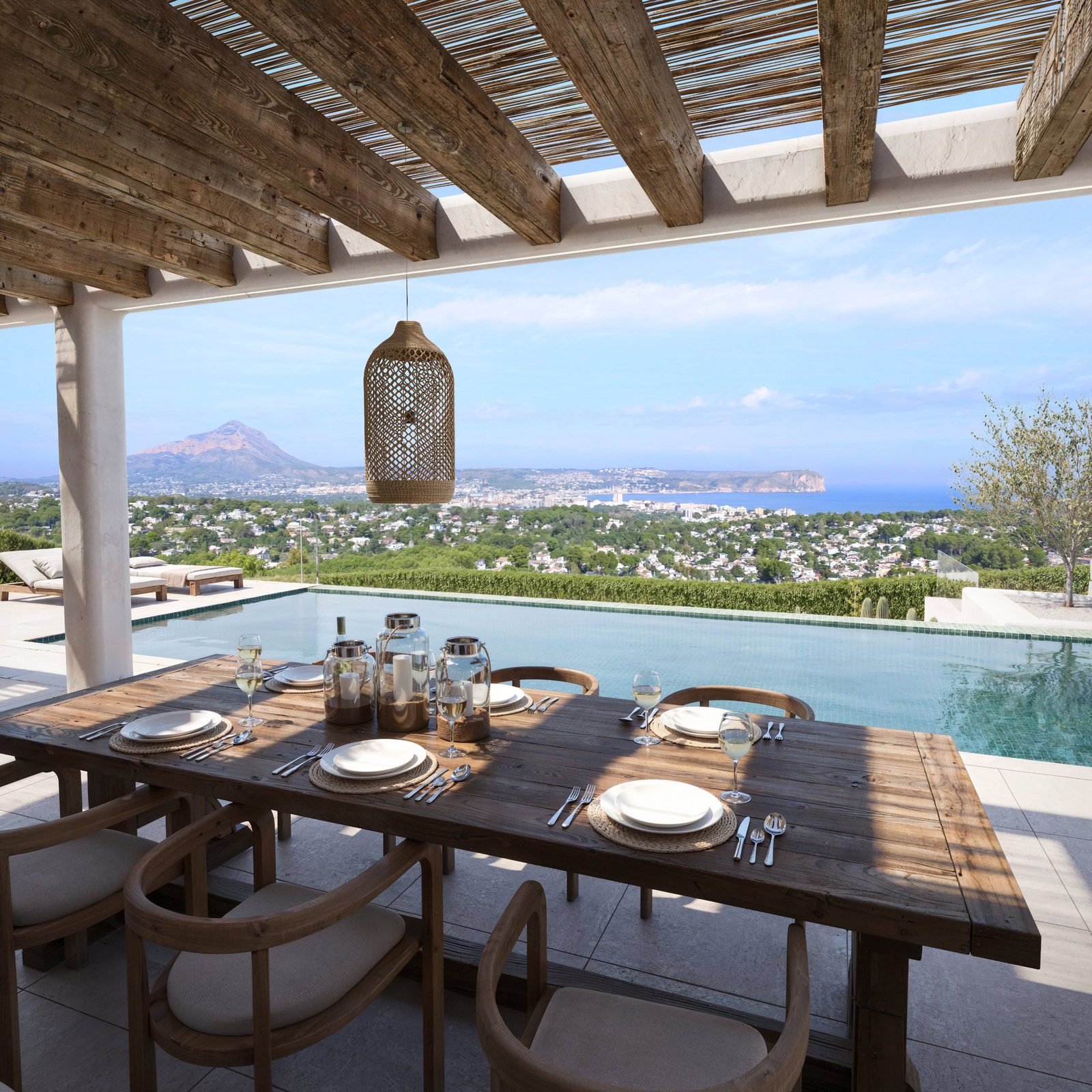 Outdoor dining area with stunning sea views at a 5-bedroom villa in Javea - The Estates