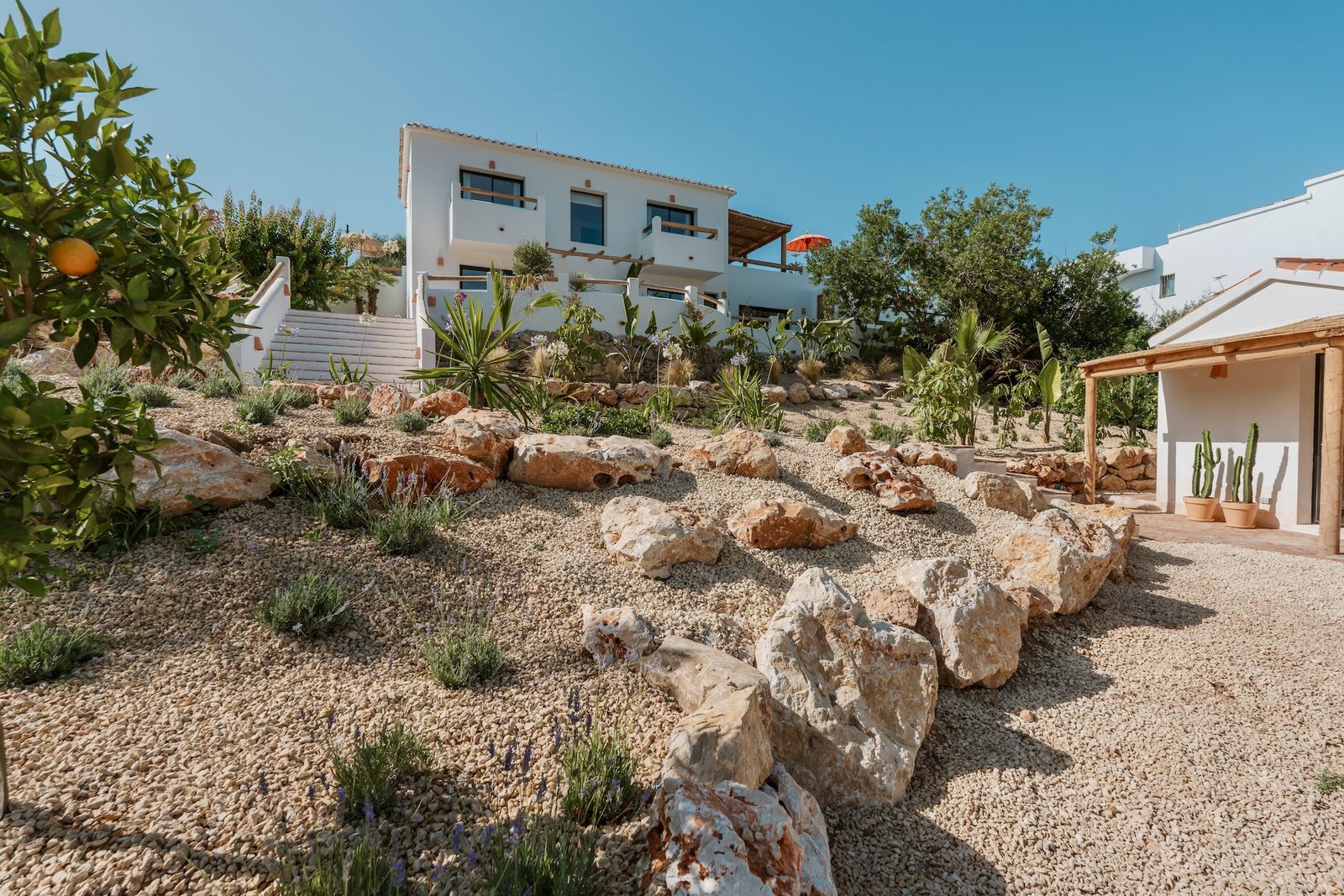 A beautiful garden and exterior of a 4-bedroom villa in Javea - The Estates