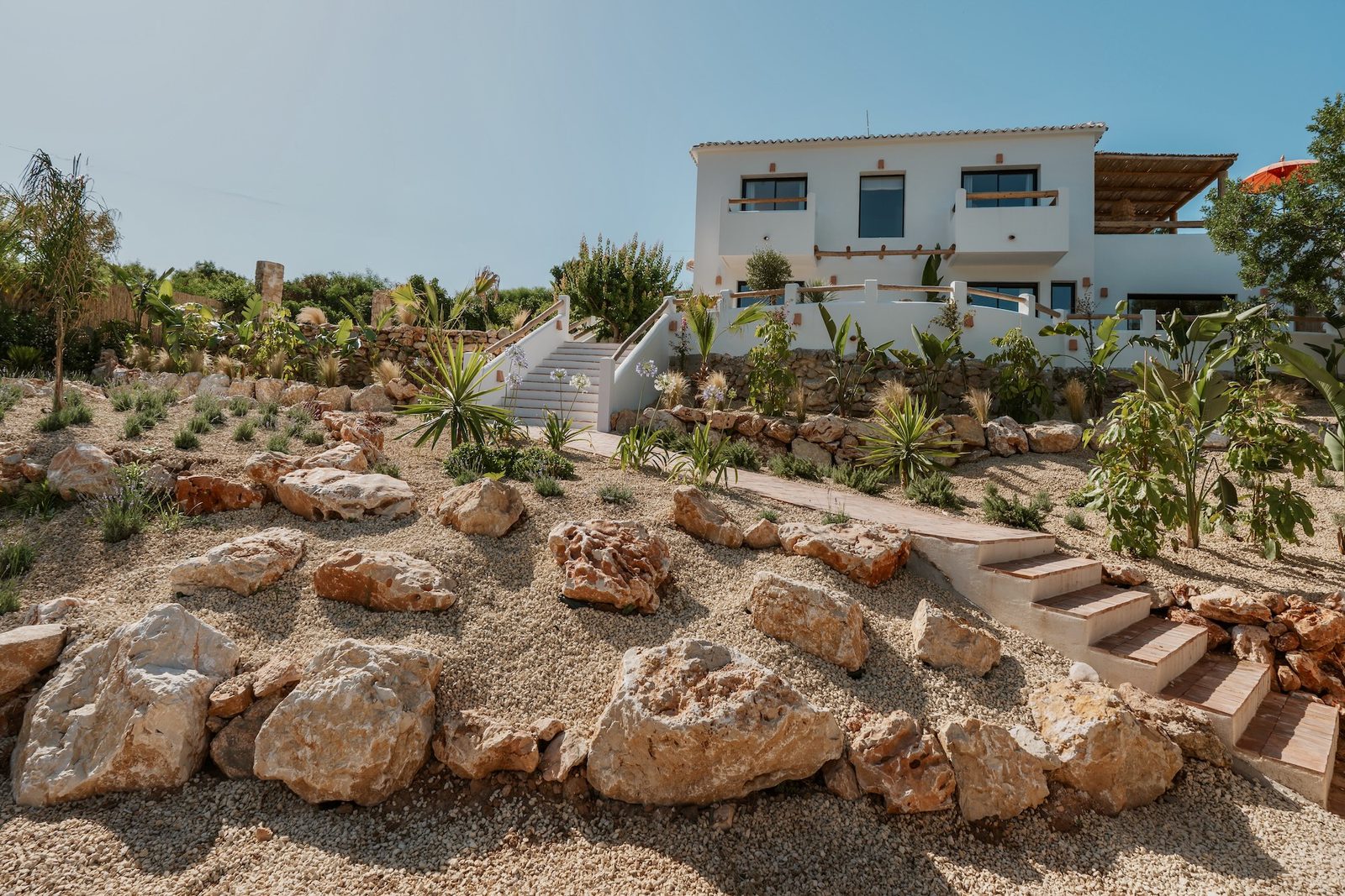 Exterior view of a 4-bedroom villa with landscaped gardens in Javea - The Estates