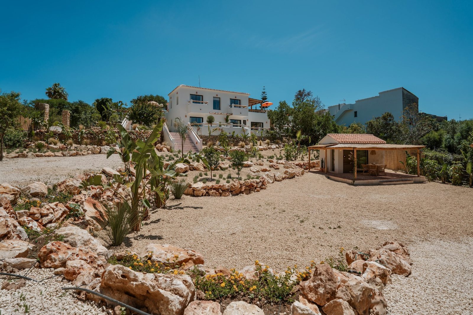 Exterior view of a 4-bedroom villa with garden and mountain views in Javea - The Estates