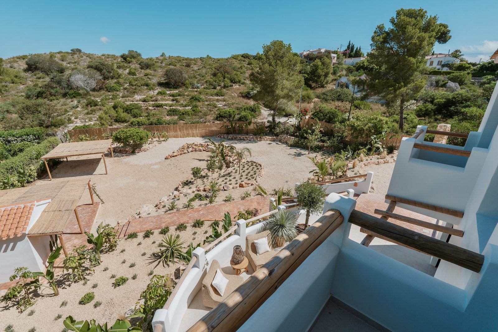 A view of the garden and countryside from a 4-bedroom villa in Javea - The Estates